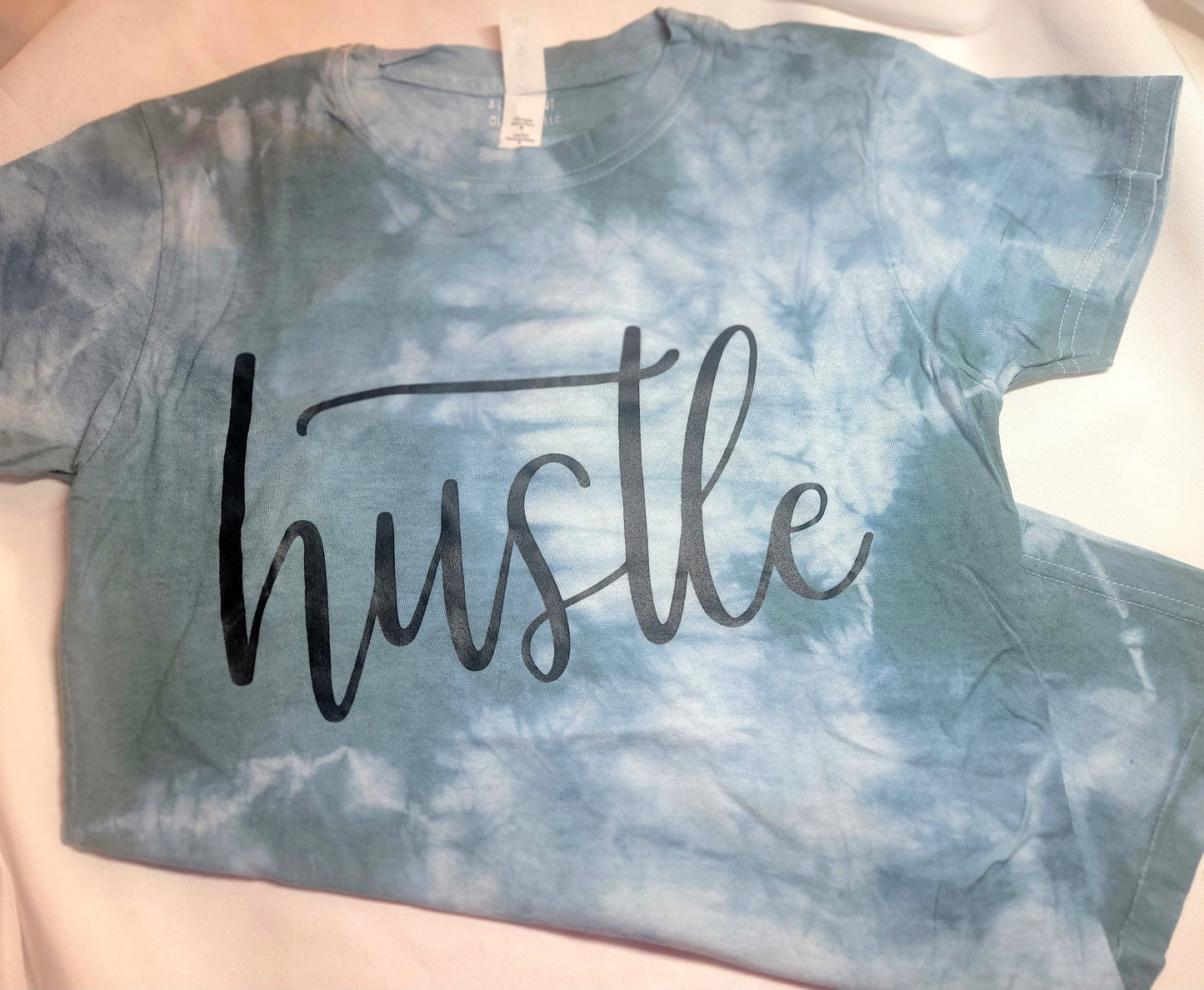 Blue/green size medium tshirt hustle