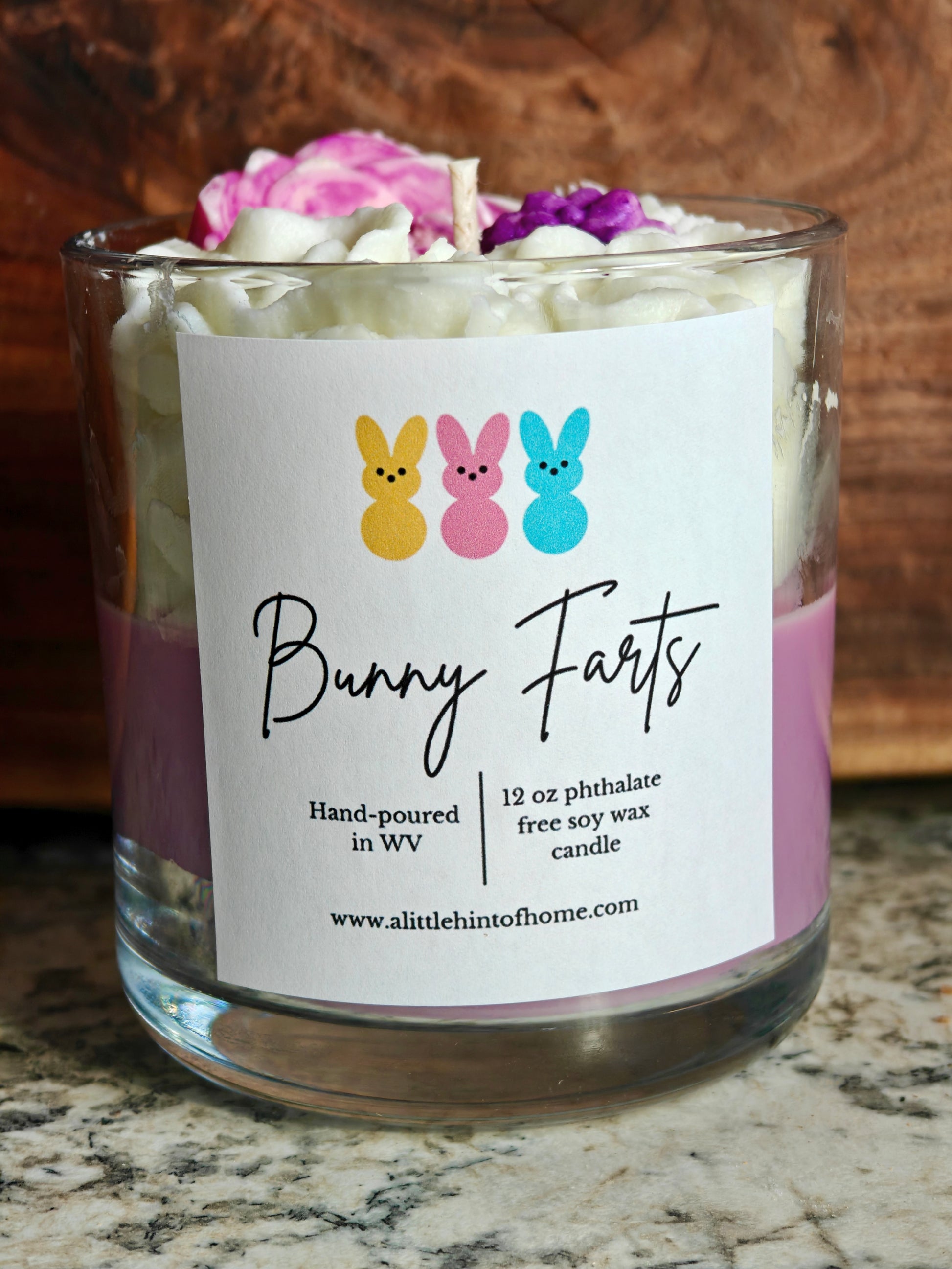 whipped candle with roses on top with label stating bunny farts