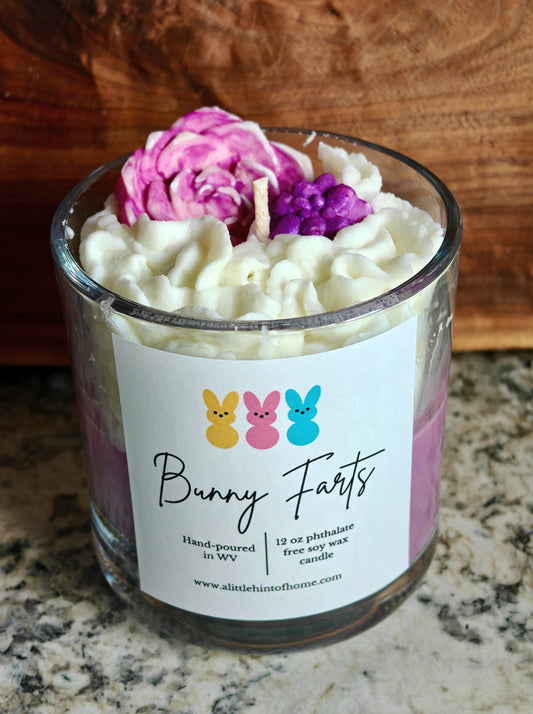 whipped candle with roses on top with label stating bunny farts